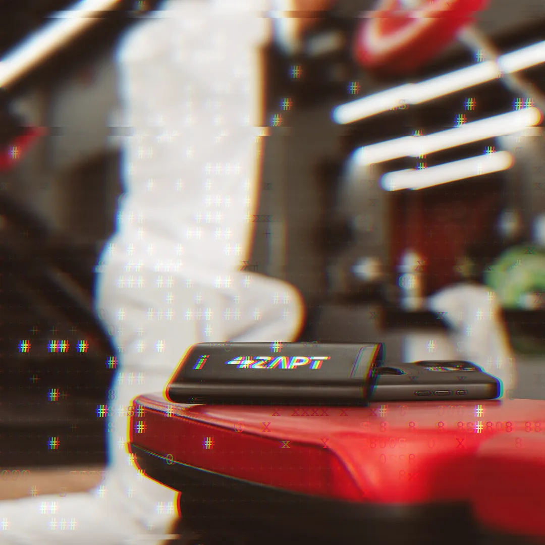 ZAPT powerbank on a gym bench under an ASCII-glitched treatment
