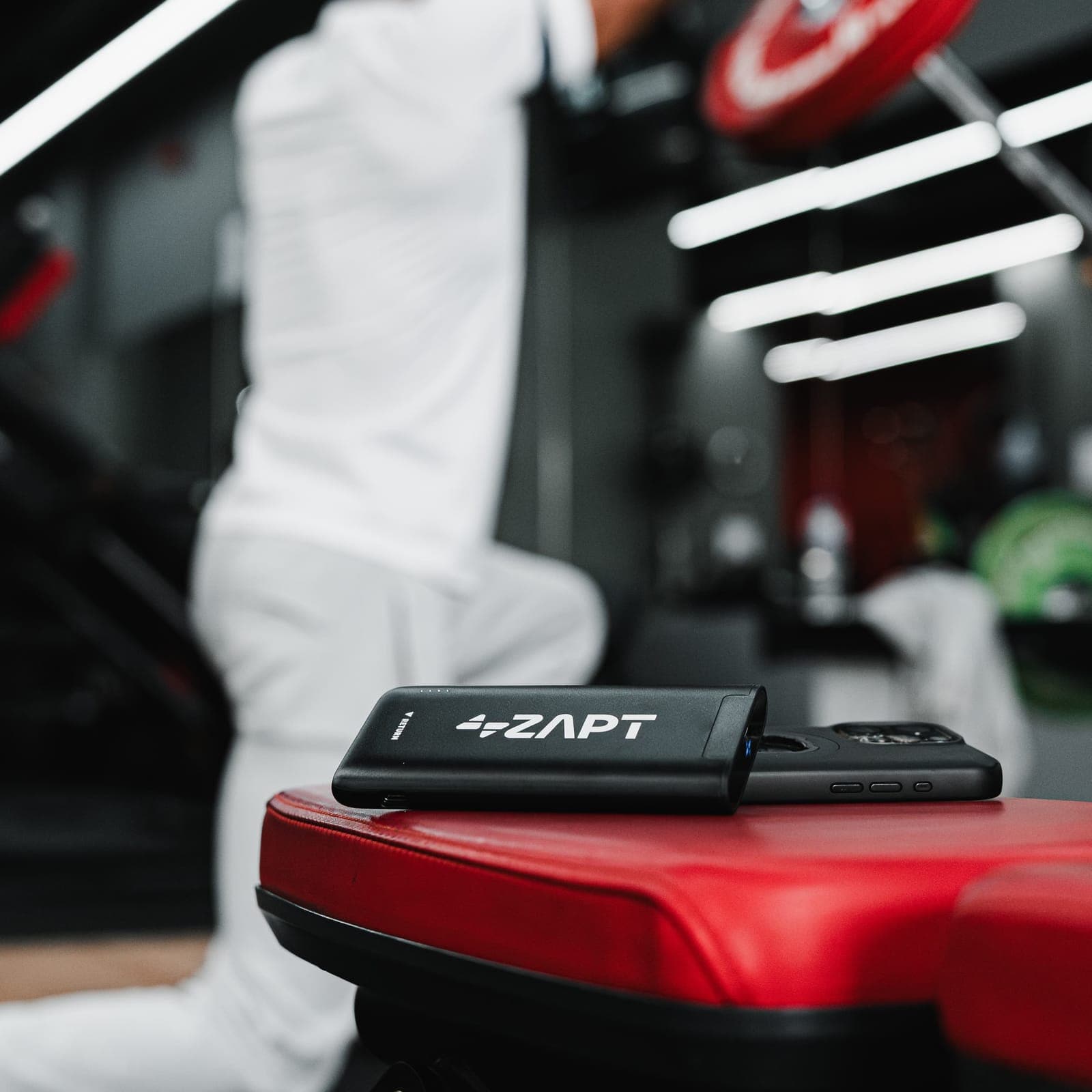 A ZAPT rental station loaded with branded powerbanks